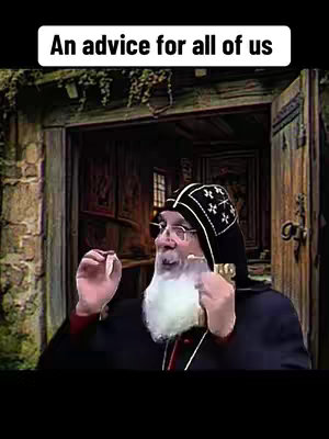 The image shows an older man with a white beard wearing glasses and a black hat. He is holding something in his hand that he seems to be looking at. The background is of a wooden door.