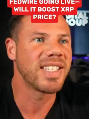 A man with short brown hair is the focus of the image. He's looking towards the right of the frame with a slight smile. Above him, a red banner reads, "FEDWIRE GOING LIVE - WILL IT BOOST XRP PRICE?" and behind him a blurred background implies an interior setting.