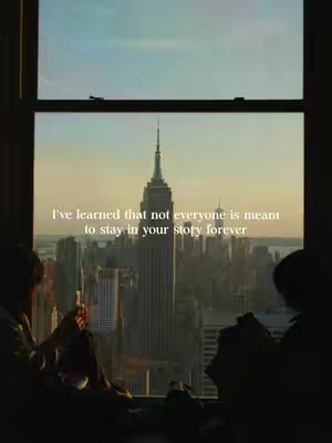 The cover image captures a serene view through a window, showcasing a metropolitan skyline dominated by the Empire State Building. The foreground features the silhouettes of two figures seated near the window frame, presumably contemplating the cityscape. Overlaying the image is a text overlay, conveying a message of acceptance regarding life's changing relationships.