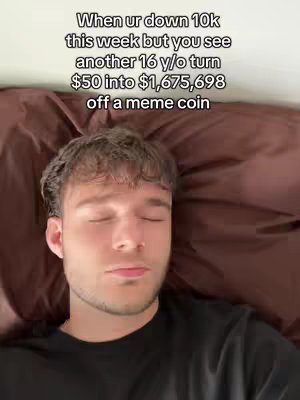 A young man with short brown hair is lying in bed with his eyes closed, appearing contemplative or frustrated. Text overlayed on the image conveys a relatable sentiment about financial outcomes.