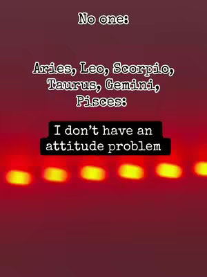 The cover image has a dark red background with a series of horizontal yellow streaks, suggesting a light effect. Overlayed in white text are the phrases "No one:" followed by a list of zodiac signs (Aries, Leo, Scorpio, Taurus, Gemini, Pisces:). Below that is a black rectangular box with white text that says "I don't have an attitude problem."