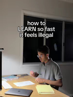 A young man with glasses is seated at a desk, working on a laptop while looking at some papers. The image has a warm, indoor lighting with the text overlay "how to LEARN so fast it feels illegal".