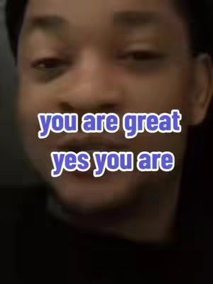 A medium shot features a Black man looking slightly up at the camera. He is the central focus, with a black background. Overlayed text in a stylized font states, "you are great yes you are."