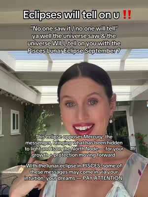 A woman with fair skin, dark hair, and blue eyes smiles widely, posed against a blurred outdoor backdrop. Above her head is a text overlay proclaiming a message about eclipses. On the upper left of the screen are the tops of a wooden trellis. Below the text, other text appears to explain the subject matter about eclipses and astrology.