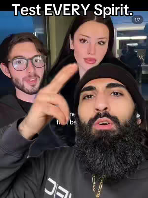 The cover image features three people interacting in a video. In the foreground, a man with a full beard and a black durag is speaking, while a man wearing glasses and a woman are behind him. The woman is centered in the background, while the man with glasses is on the left. The man in the front is pointing with his index finger, suggesting emphasis or instruction. The overall lighting seems adequate, without strong shadows.