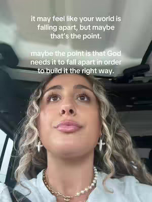 The cover image features a woman looking upwards with text overlayed. She has long, wavy blonde hair and is wearing earrings and a necklace. The background suggests she is seated inside a vehicle.