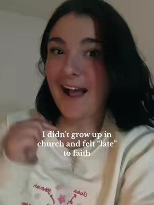 The cover image features a young woman with dark hair, looking directly at the camera with a slightly open mouth. Text overlayed on the image states, "I didn't grow up in church and felt "late" to faith". The background appears to be a lightly colored wall, and she is wearing a light-colored top. The lighting is soft, focusing on the woman's face and expression.