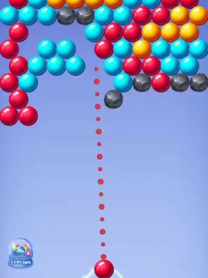 The image shows a screen capture of a mobile game, likely a puzzle game. The background is a gradient light blue. Colored bubbles fill the upper half of the screen, with a few detached at the top left. The bubbles are various colors: red, teal, yellow, and black. A red ball is at the bottom, connected by a red line with dots.