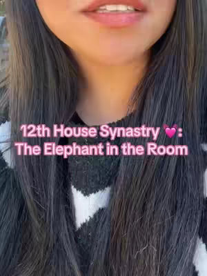 The cover image shows a close-up view of a person's face, focusing on their lips and the lower part of their face. The person is wearing a black sweater with a white pattern. Text overlay on the image reads "12th House Synastry: The Elephant in the Room" in a pink font.