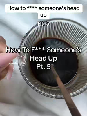 The cover image shows a top-down view of a clear glass cup filled with dark liquid, likely coffee, a spoon is inside. The image is set on a light surface. Text overlays on the image. Overlaying text reads: 'How to f*** someone's head up Pt. 5' indicating the video content is the fifth part of a series on a manipulation topic, which can be seen in the caption as well.