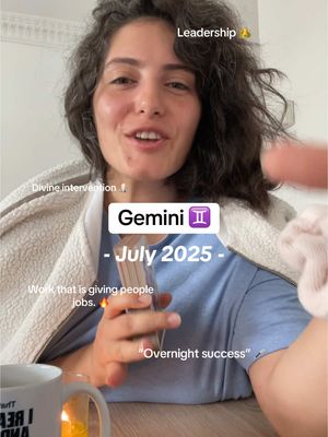 A woman with curly dark hair is centered in the frame, looking towards the camera. Text overlays include astrological references such as `Gemini` and dates, with additional phrases like `Leadership` and `Divine intervention`. The overall tone is astrology-focused.