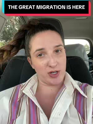 A woman with long dark hair in a braid is seated in a car, looking directly at the camera and speaking. The background includes the car's interior and a blurred view through the windshield. The text overlay, 'THE GREAT MIGRATION IS HERE,' is displayed in a red box at the top of the image.