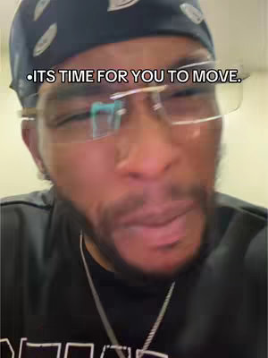 A close-up shot of a man with a beard, glasses, and a bandana, looking directly into the camera. Text overlay reads, 'ITS TIME FOR YOU TO MOVE.'