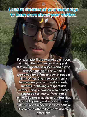 A selfie-style shot featuring a person with dark skin wearing glasses, a headband, and headphones. The person is centered in the frame with the upper body visible. Text on top of the person reads "Look at the ruler of your moon sign to learn more about your mother." The background is a blurred mix of green.