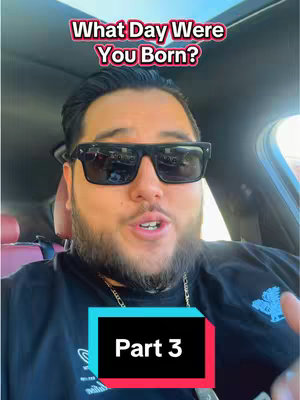 A selfie-style video cover with a man in sunglasses sitting in a car. Overlaid text reads 'What Day Were You Born?' The man is the primary focus, with a text overlay in the bottom center that says 'Part 3'. The background is blurred, likely the inside of a car.