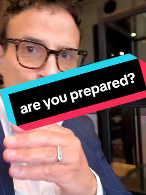 A close-up shot of a man with glasses holding a phone, a text overlay that says are you prepared? is placed diagonaly in front of his face.