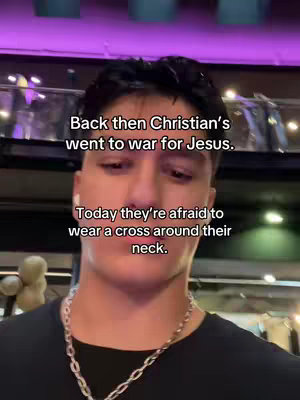 A man with short dark hair and light skin is centered in the frame, looking slightly up towards the camera. The background is blurred but appears to be indoors, possibly a store or restaurant. Text overlays on the image present a statement about Christians at war and today.