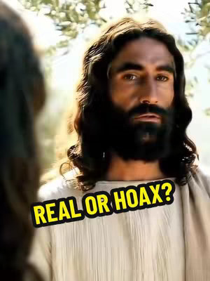 The cover image presents a medium shot featuring a person who is likely Jesus. They are centrally positioned, looking slightly downwards with a concerned expression. The background is somewhat blurred, featuring hints of greenery and natural light. A yellow rectangular text overlay saying 'REAL OR HOAX?' is placed at an angle in the lower part of the image. The person is wearing light-colored robes and has long brown hair and a beard. The overall composition focuses on the person's face and expression, with the text overlay adding a question element