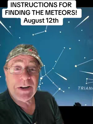 A man with glasses and a baseball cap is in the foreground, looking directly at the camera. Behind him is a dark blue background with stars and some white lines, meant to represent a constellation. Above him, white text says, 'INSTRUCTIONS FOR FINDING THE METEORS!' and 'August 12th'.