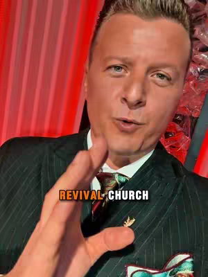 A man in a dark suit with a patterned tie and a pin on his lapel gestures towards the viewer, with the text 'REVIVAL CHURCH' overlaid on the image.