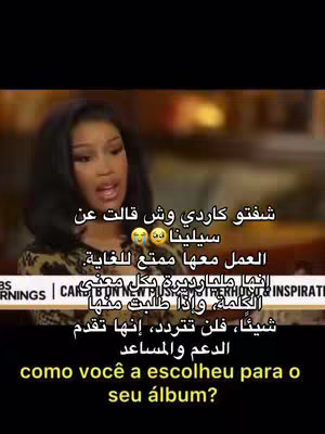 The cover image is a video clip featuring a medium shot of a woman with long dark hair. The background appears to be an interview setting. Text overlays in Arabic and Portuguese are added to the image. The woman is speaking, and the overall composition is a direct presentation.