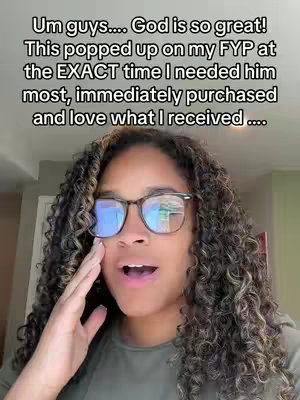 A woman with curly dark hair and glasses is looking at the camera. Text overlays the image, including the phrase "God is so great".