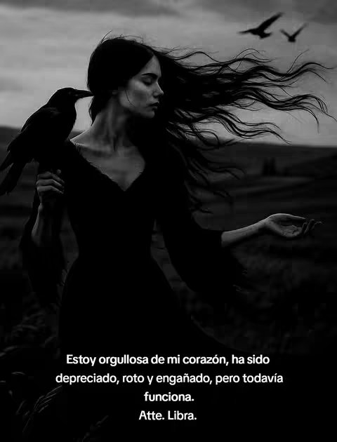 A grayscale image features a woman in a dark, flowing dress, standing outdoors. Her long hair is swept back by the wind. A black crow perches on her shoulder. Below, a text overlay displays a quote.
