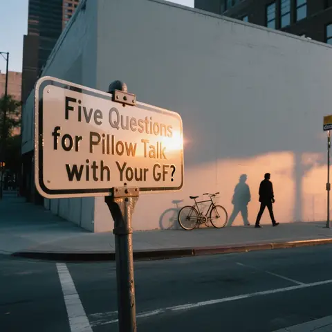 An outdoor shot featuring a street scene at sunset. A sign is prominently displayed with the text, "Five Questions for Pillow Talk with Your GF?" Shadows of a bicycle and two figures (a person walking and a shadow) are cast on a white wall, creating a long, linear composition. The image has warm lighting, primarily oranges and yellows, suggesting a time near dusk or dawn.