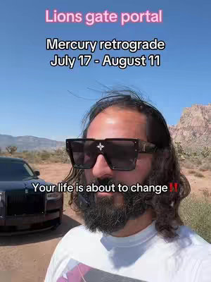 A man wearing sunglasses stands in front of a black car with a desert landscape in the background. Text overlays include "Lions gate portal" and information about Mercury retrograde.
