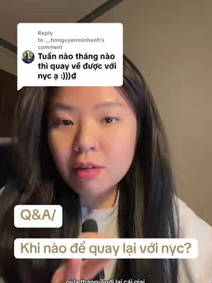 A young woman with long dark hair looks toward the camera, with a comment overlayed in the top left corner and text boxes at the bottom. The background appears to be a room with a neutral color wall.