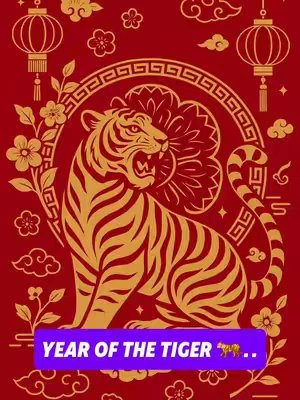 The cover image features an illustrated depiction of a tiger, rendered in shades of gold against a vibrant red background. The tiger is the central focus, positioned in a dynamic pose within what appears to be an ornate circular frame. Decorative elements, including lanterns, flowers, and cloud-like patterns, embellish the backdrop, suggesting a celebration or festive theme. A purple banner at the bottom displays the text 'YEAR OF THE TIGER'.