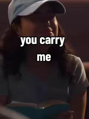 The image shows a person wearing a hat. The hook "you carry me" is superimposed on the image.