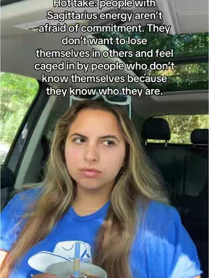 A young woman with long, blonde hair is seated in a car, looking slightly pensive. The scene seems to be filmed from her point of view. Above her is a text overlay with a 'Hot take'