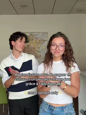 The cover image depicts two young adults in a room with a map on the wall. They are both smiling and appear to be applauding. Text overlays are present, describing the content.