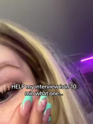 A close-up shot shows part of a person's eye, eyelashes, and manicured fingernails. The text overlay says: "HELP my interview is in 10 min what one..."