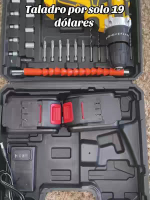 The cover image displays a black case with various compartments holding tools, including a yellow and black drill, drill bits, and other accessories. The layout is organized and professional.