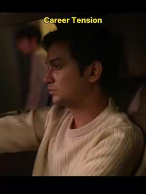 The cover image shows a man looking out the side window of a car. The lighting has a warm, low-key appearance. The text overlay reads "Career Tension". The composition shows the man in the foreground with a blurred out person in the background to the left, suggesting space and depth.