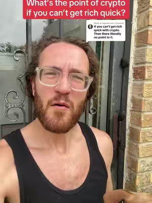 A man with curly brown hair and a beard is the central focus. He wears glasses, and a black tank top, standing slightly off-center in front of a brick and metal door. Text overlays read "What's the point of crypto if you can't get rich quick?" and a comment bubble displays text.