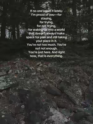 An image of a rocky surface in the foreground with a forest in the background. Overlayed is a poem expressing pride and reassurance; it's white text against the darker background.