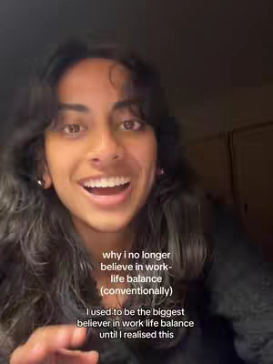 A selfie-style video cover image featuring a woman with dark hair and a bright smile, set against a dim background. The woman is centered in the frame, with text overlayed on the image describing the video's topic.