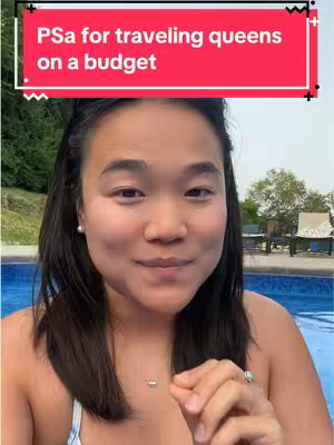 A woman with dark hair is smiling at the camera. She is wearing a white and blue top and a necklace. Behind her is a swimming pool, trees and a sunny sky, and a red rectangle with white text at the top. She is holding her hand up in a gesture.