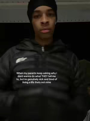 A young man with a black beanie and a black jacket is the central focus. He is looking directly at the camera, with text overlaid at the bottom describing a frustration with parental expectations.