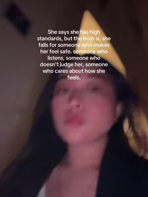 The cover image shows a blurred close-up of a woman's face. Text is overlaid on the image. The background is dimly lit.