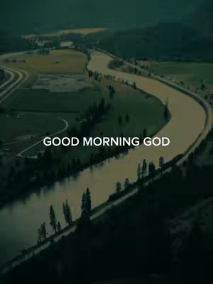 An aerial shot of a river winding through a green landscape with mountains in the distance. The words 'GOOD MORNING GOD' are overlaid in white at the bottom.