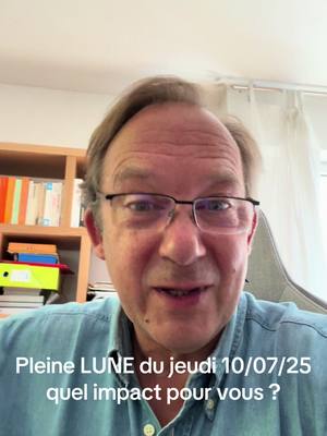 A middle-aged man with glasses smiles at the camera, set against an interior backdrop that includes a bookshelf. Text overlayed at the bottom of the image.