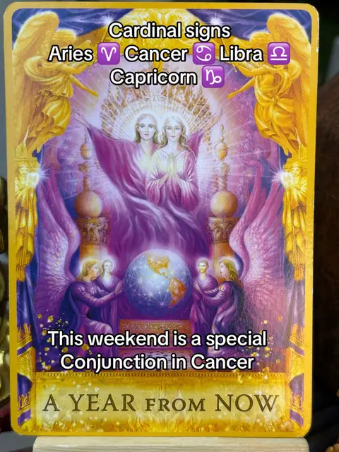 A tarot card with a golden border featuring a celestial image with two angels. The card includes text overlays about cardinal signs and a special conjunction.
