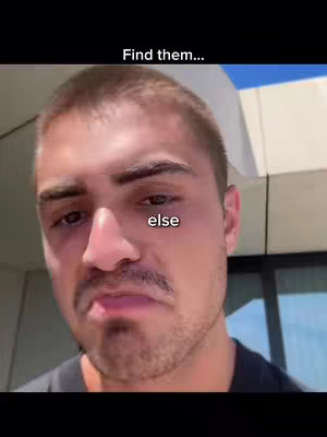 A close-up shot of a man's face with text overlays. The man has short hair and a slight smirk. Above his head is the text "Find them...", and below his eye appears the word "else". The background is slightly blurred and appears to be an exterior view.