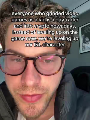 A close-up shot of a man with glasses looking towards the camera, with overlaid text. The background is blurred, suggesting an indoor setting.