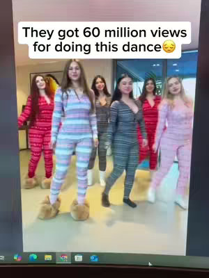 The image shows a group of six women in matching sleepwear. They are in a bright, modern interior, likely a home, moving to the right. The women all have their hair down. The image has a rectangular text at the top that reads 'They got 60 million views for doing this dance' in black.
