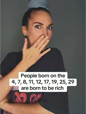 A woman covers her mouth with her hand in a surprised manner while looking directly at the camera. Text overlay on a white box stating the born dates of destined wealthy people.
